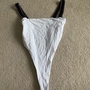 White bodysuit with cut out near the hips